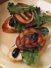 Recipe Photo: Grilled Bread Topped with Arugula, Goat Cheese, Olives and Onions