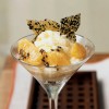 Warm Oranges in Sake Cream with Sesame Brittle